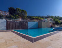 swimming pool, sky, outdoor, ground, water, pool, swimming, building